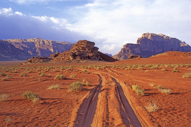 Best of Wadi Rum | Full day Jeep tour + Sleep under the stars | Pack all-in - Khazali Canyon and Nabatean carvings