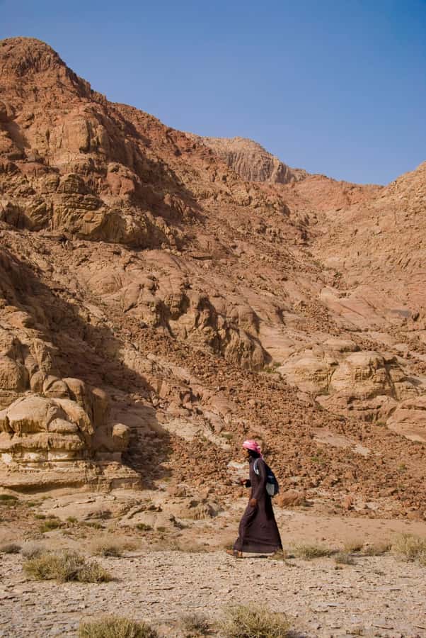 From Aqaba: Wadi Rum Jeep Tour with Hotel Pickup & Drinks - Leaving Aqaba in a small transfer vehicle