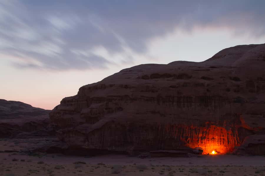 From Wadi Rum: Jeep Tour with Overnight Desert Camping - Dinner cooked beneath the sand