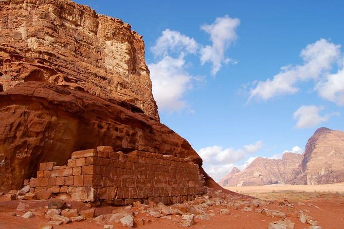 Full-Day Jeep Safari "Wadi Rum Highlights!" w/ Bedouin Lunch - Springs, inscriptions, and changing rock formations