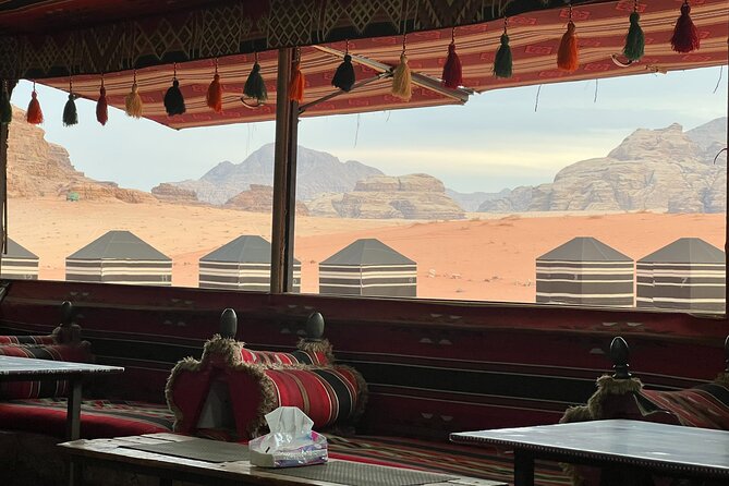 Full Day Jeep Tour and Overnight in Bedouin Camp with Meal - A traditional lunch beside the rocks