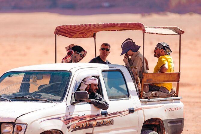 Full Day Jeep Tour in Wadi Rum Desert | Magic Bedouin Star - Lawrence Spring starts the day with a climb