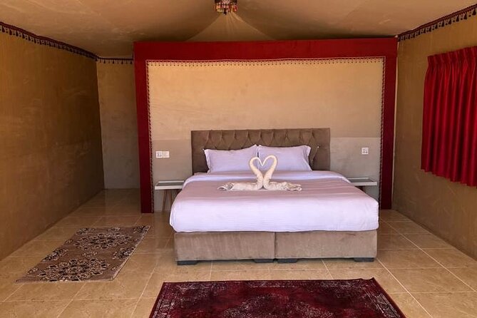 Full-Day Jeep Tour & Sleep in Luxury Tent with private Bathroom - Reading the rock walls at Khazali Canyon
