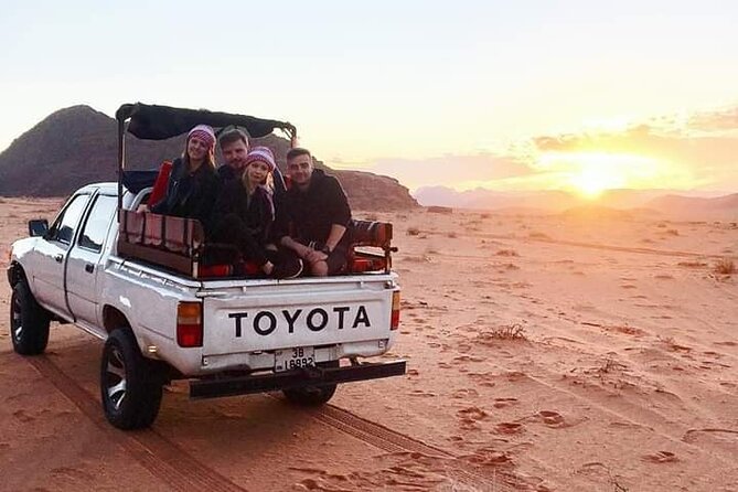 Full Day Jeep Tour with Overnight in Bedouin Camp - Red dunes and sandboarding near famous film sites