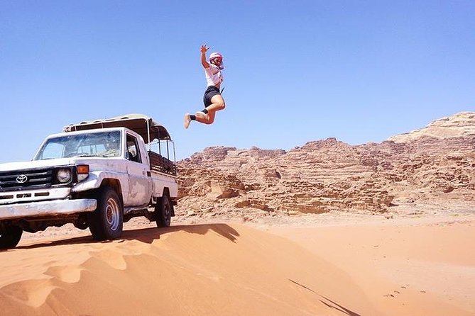 Half-Day Jeep Safari "Wadi Rum Highlights!" w/ Professional Bedouin Guide - Springs, Canyons, and Ancient Cave Writings