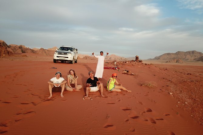 Half-Day Jeep Safari "Wadi Rum Highlights!" w/ Professional Bedouin Guide - Red Sand Dunes and Sandboarding