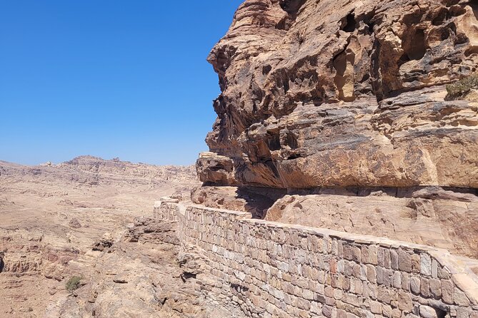 Private Petra Back Entrance Tour with Guide . - Royal Tombs and the view toward the Theater