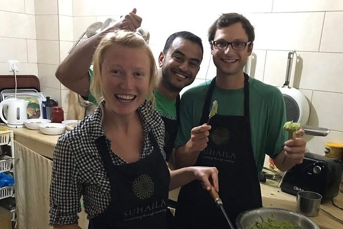Suhaila (connecting through cooking) - Eating on the floor in the traditional way