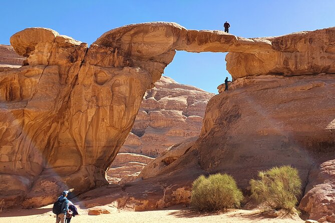 Wadi Rum 2-Day Jeep Tour with Meals and Overnight in Bedouin Camp - Burdah Bridge from below, then Abu Khashaba Canyon on foot
