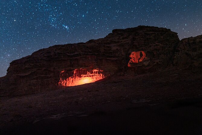 Wadi Rum Cave Camping with Jeep Tour - Khazali Canyon offers a closer look at the rock