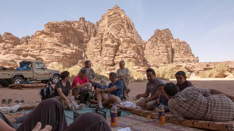 Wadi Rum: Explore 10-Hour Jeep Tour Pass, Guide, Meal & Stay - Private Bedouin tent and evening camp life
