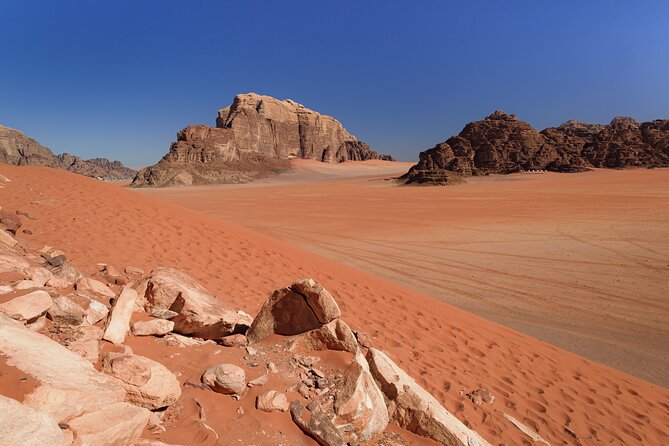 Wadi Rum: Explorer Jeep Tour PASS + Local Food + Optional Stay - The old Toyota is part of the experience