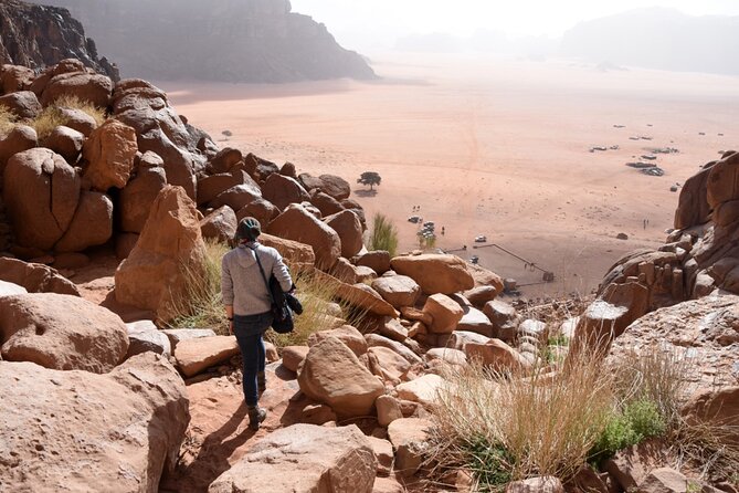 Wadi Rum: Explorer Jeep Tour PASS + Local Food + Optional Stay - Lawrence’s Spring and the first red dunes