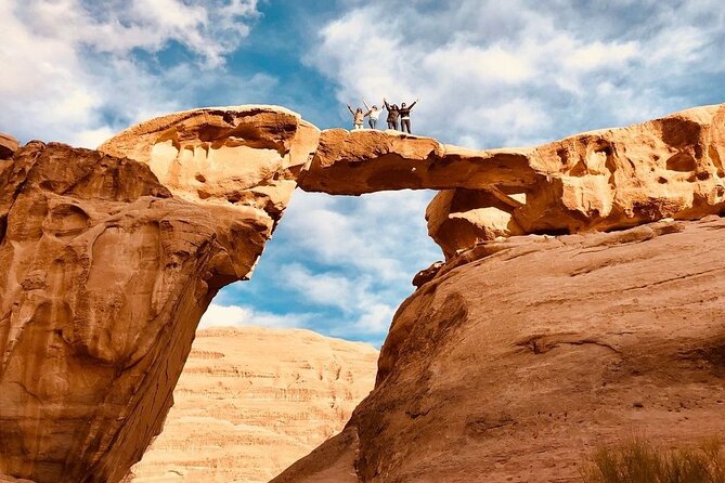 Wadi Rum Full Day Jeep Tour + Overnight in Bedouin Camp & Dinner - Walking through Abu Khashaba Canyon